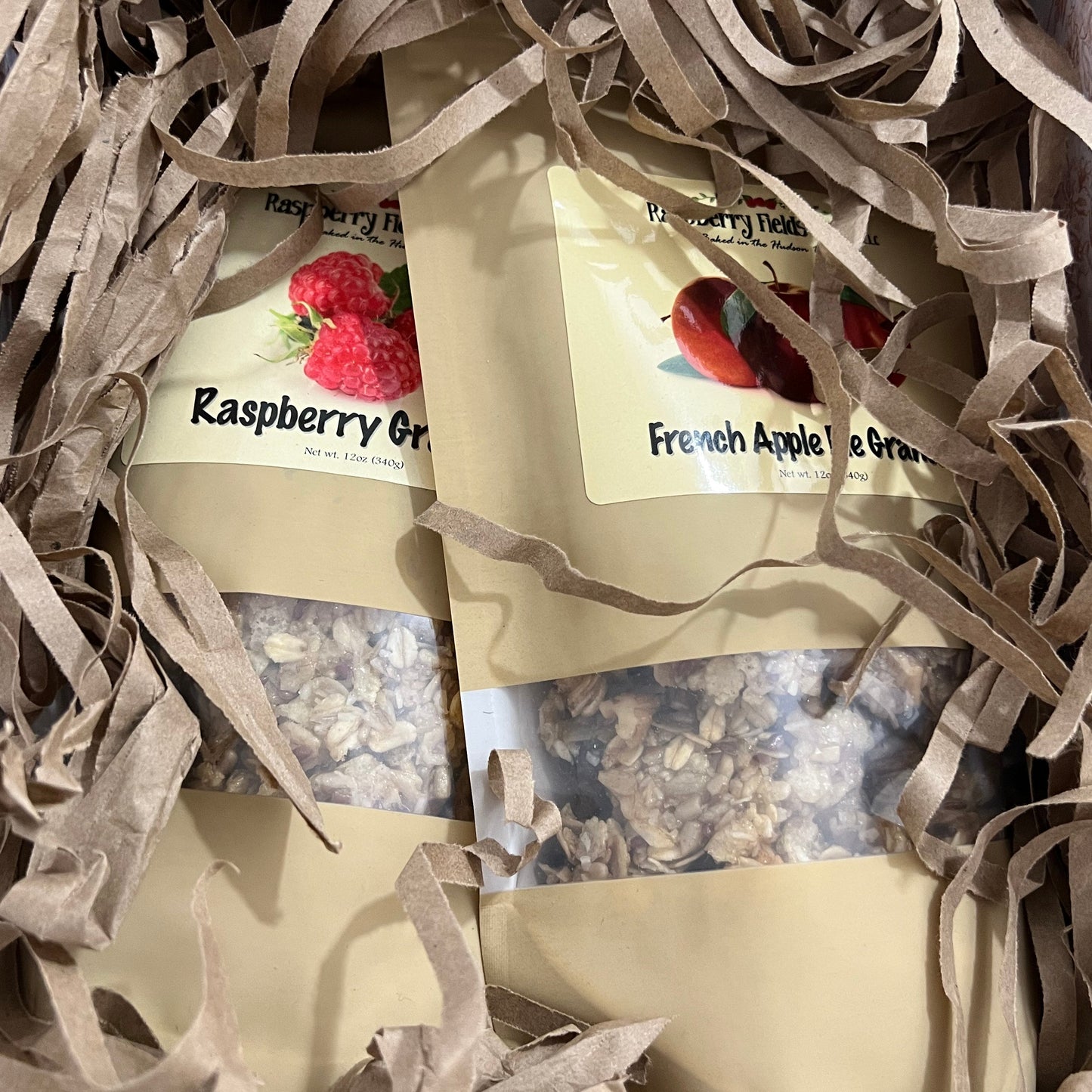 Packaged granola on shredded paper