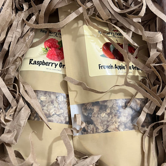 Packaged granola on shredded paper